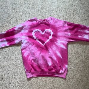 https://poshmark.com/browse/urban-outfitters-heart-sweater